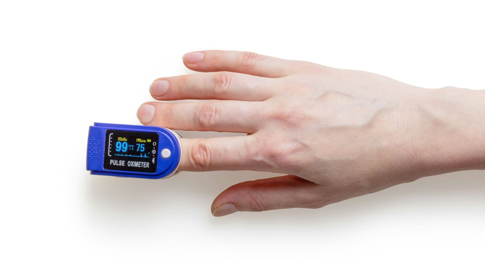 Finger pulse oximeter showing SpO2 reading of 99 percent used for monitoring blood oxygen at altitude